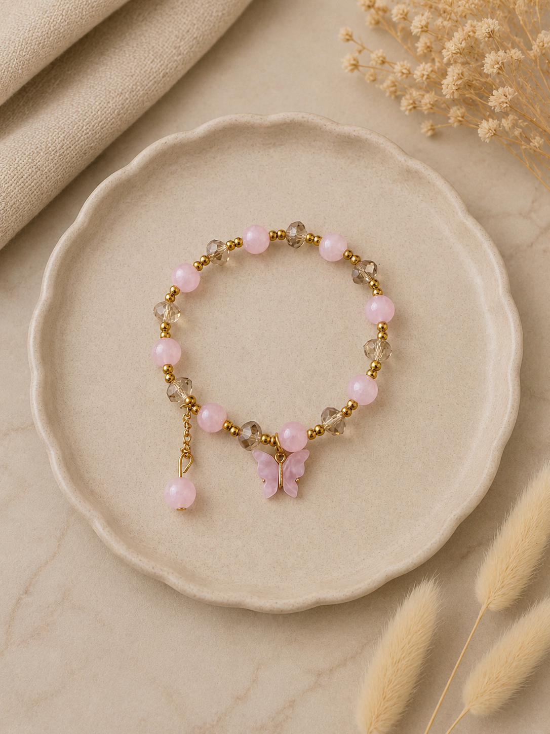 Elastische Kralenarmband Vlinder Roze Goudkleurig | By Jule Sieraden